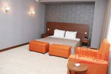 Спальная отеля Caspian Business Hotel